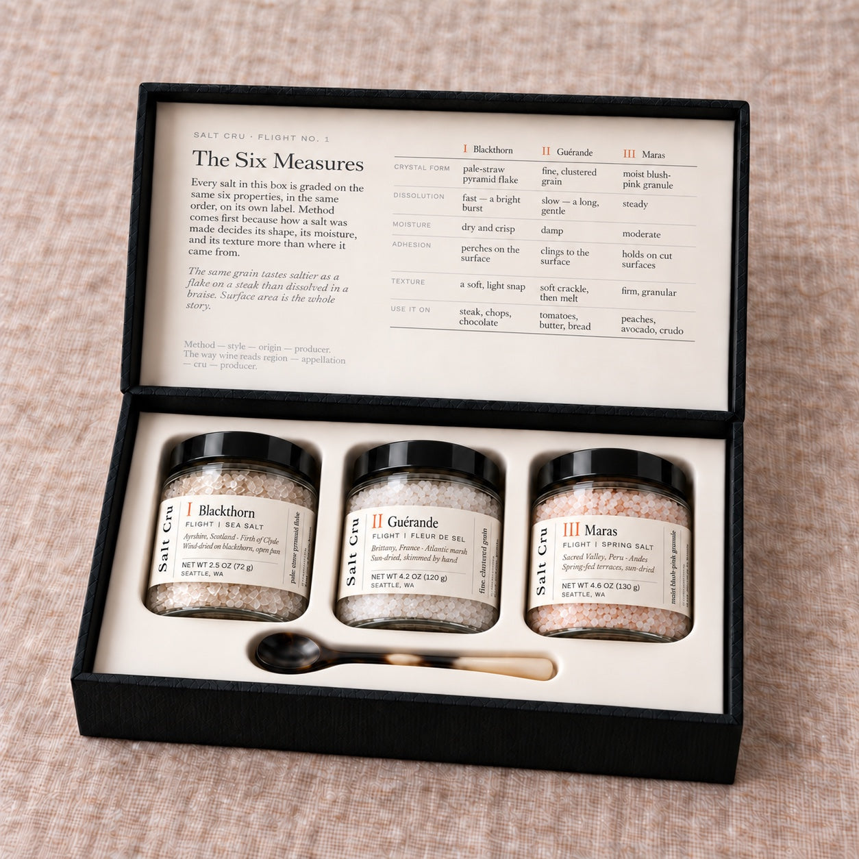 The complete Salt Cru flight: three jars and an ox-horn spoon in a fitted case