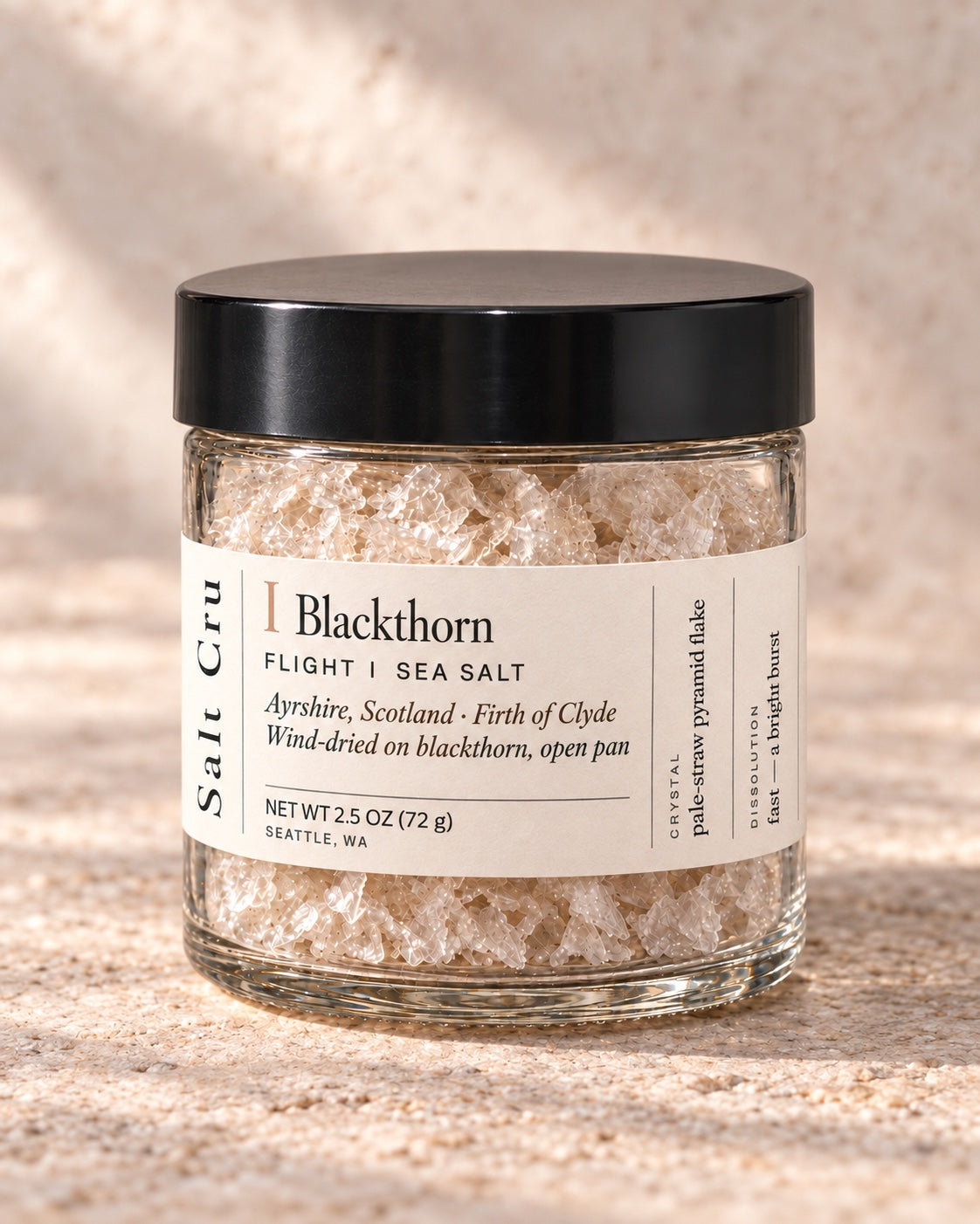 Blackthorn finishing salt in the compact jar with the cream wrap label and broad black lid